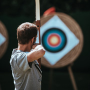A young archer practising