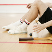 Squash players in the middle of a game