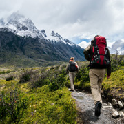 Lady hiking along a coastpath
