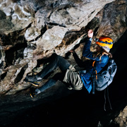 Caver preparing to climb
