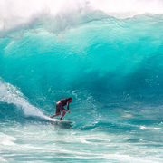 A surfer having caught a wave