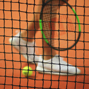 A tennis player hitting a forehand
