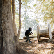 A paintballer taking aim